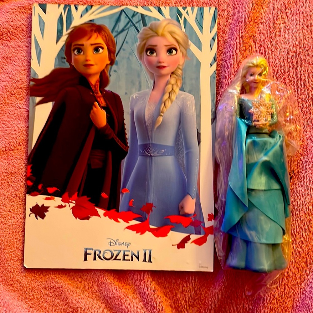 Frozen picture and battery operated doll